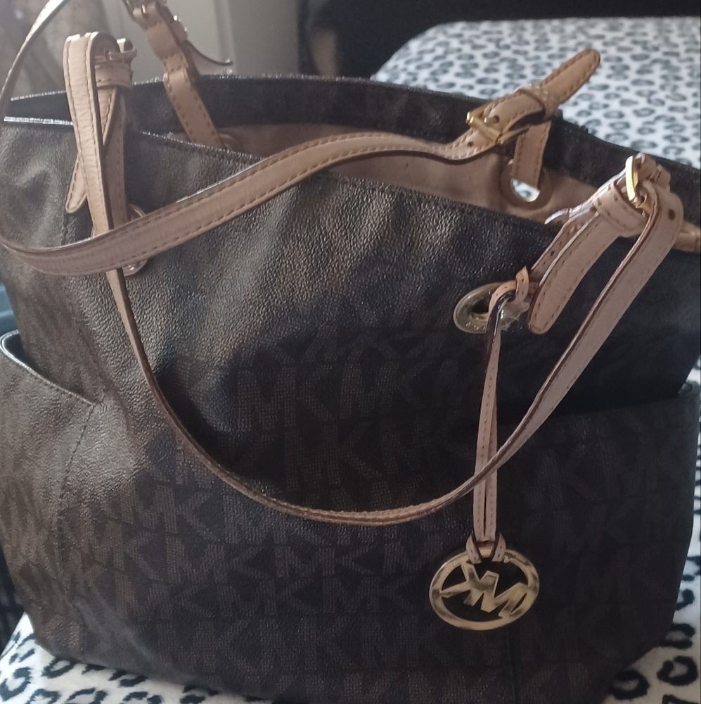 Women's Michael Kors purse large size color brown with MK logos